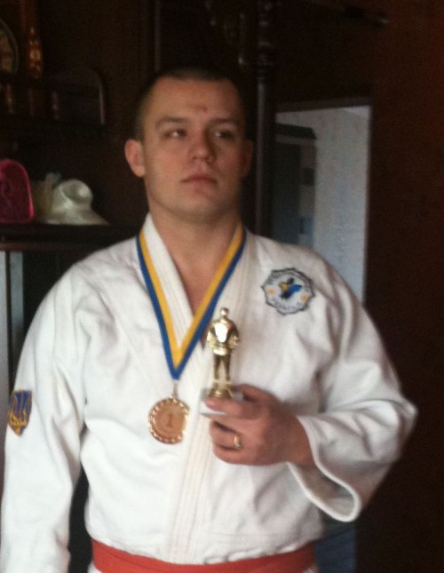 Вітаємо спортсмена та його тренерів!